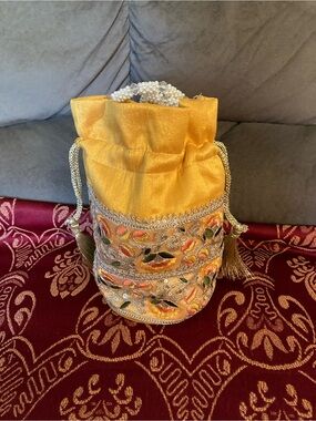Yellow Embroidered Drawstring Potli Bag with Pearl Handle